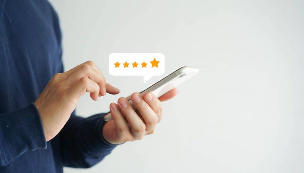 reading online reviews on a smartphone